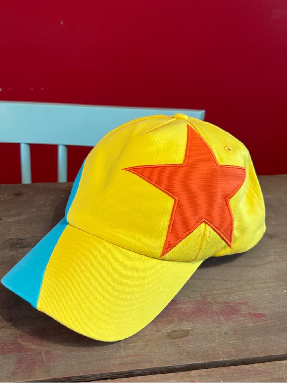 Disney exclusive Pixar Cap in Yellow, Aqua, and Orange like new